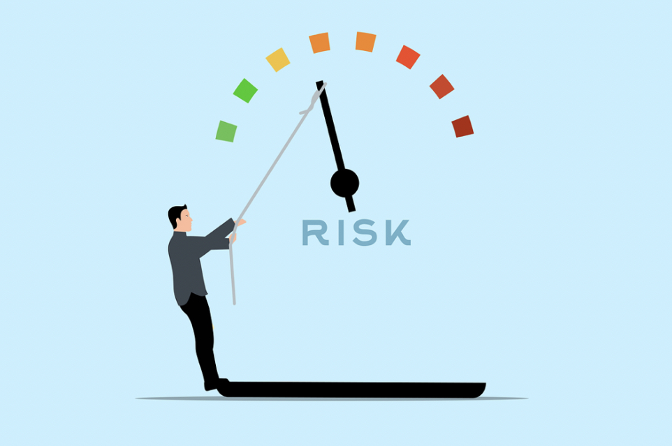Illustration of man pushing up a risk meter with colorful blocks flying