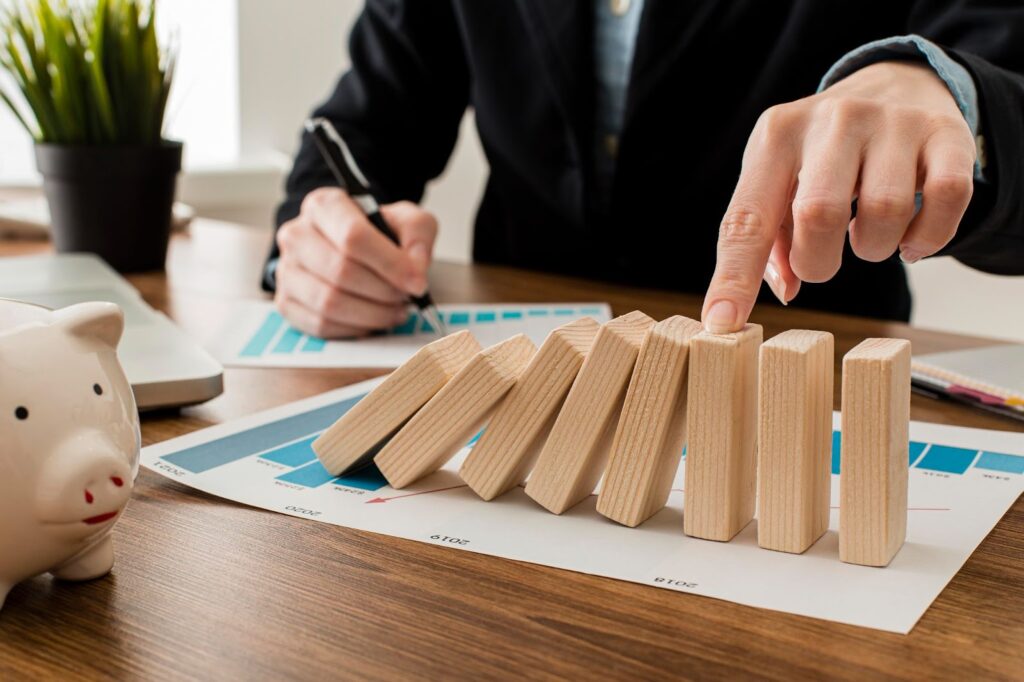 Close up of businessman at the office hold wooden blocks